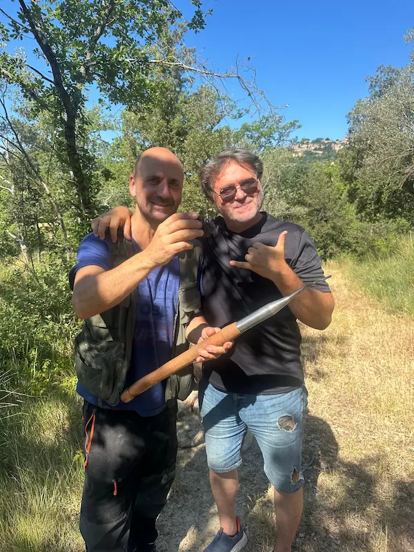 Fabrizio with a local truffle hunter during a private truffle hunting experience in Val d'Orcia