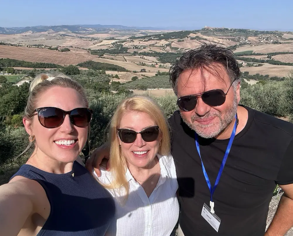 Fabrizio with happy guests overlooking the Tuscan countryside during a private tour